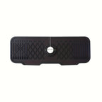 Black rubber mat with textured surface on a white background
