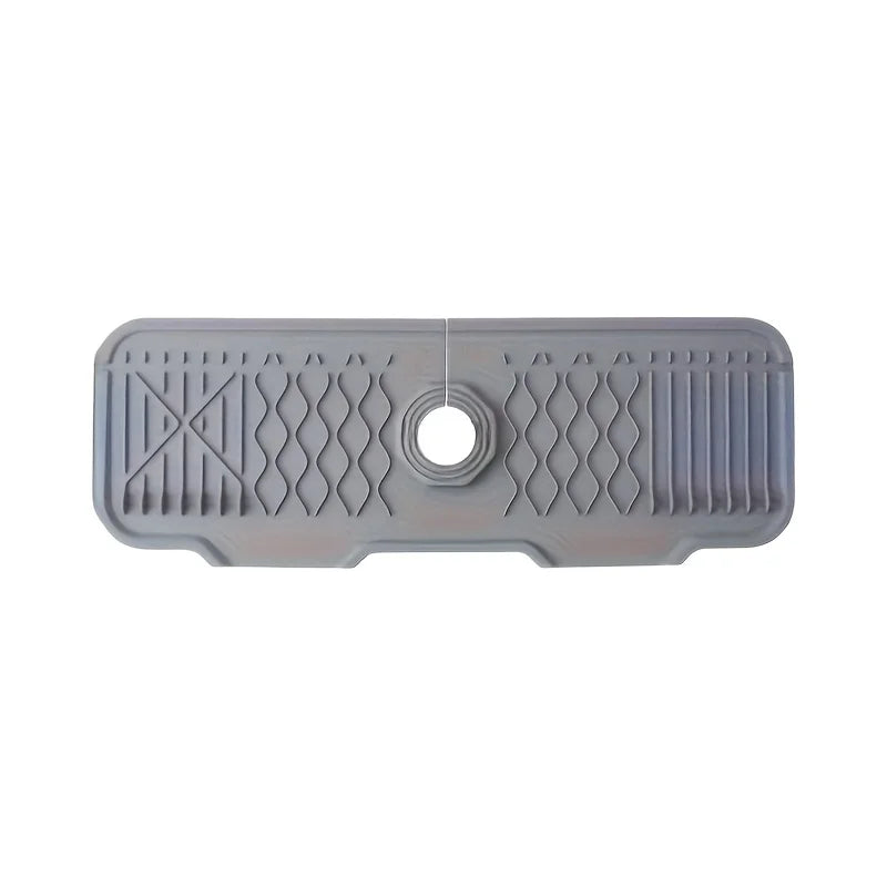 Gray rubber mat with textured surface and central hole on a white background