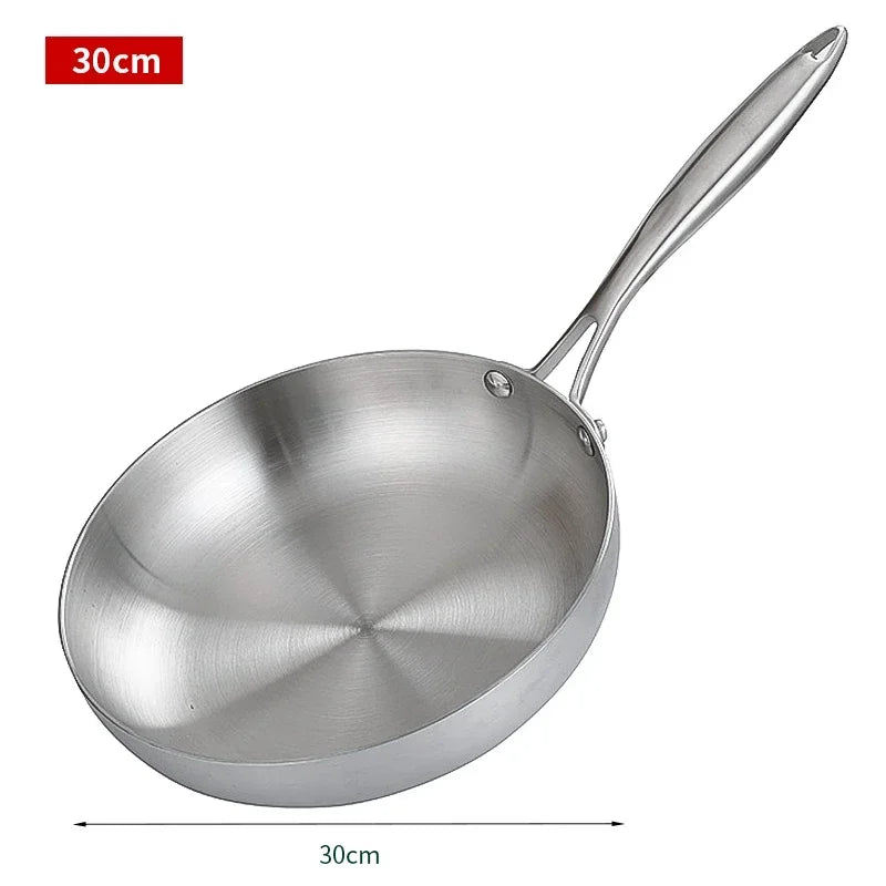 Stainless steel frying pan with handle on a white background