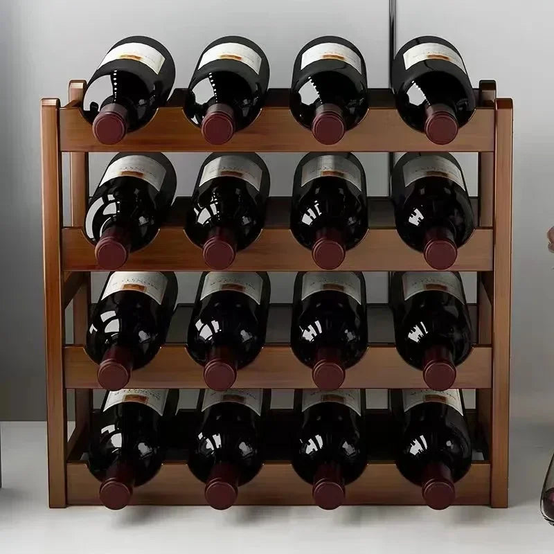 Wooden wine rack with 16 bottles of wine on a white surface.